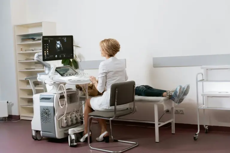 Ultrasound room scene representing RealOptions pregnancy imaging support.
