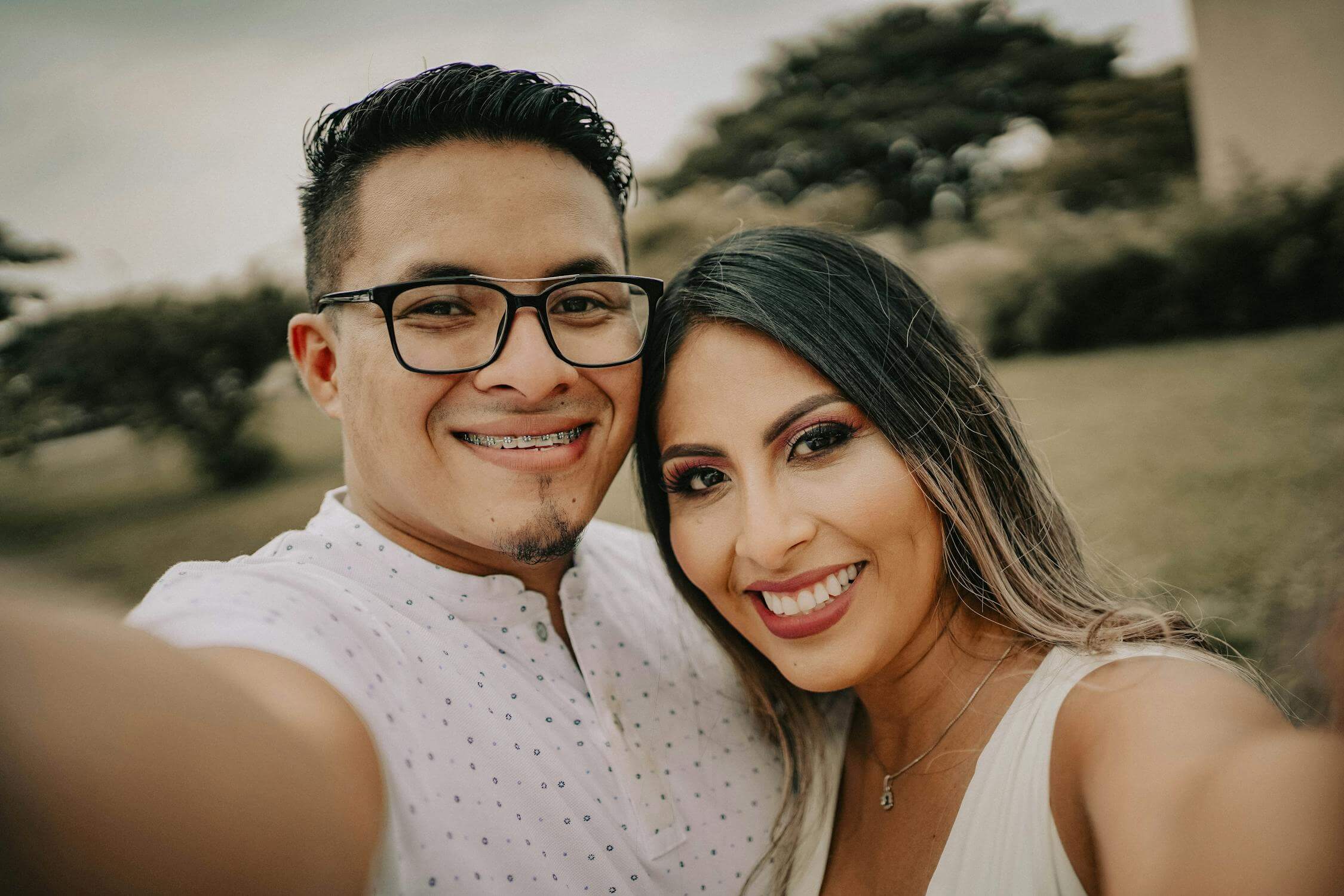 Young hispanic couple smiling